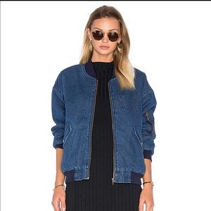 Front pocket bomber jacket with faux Sherpa lining